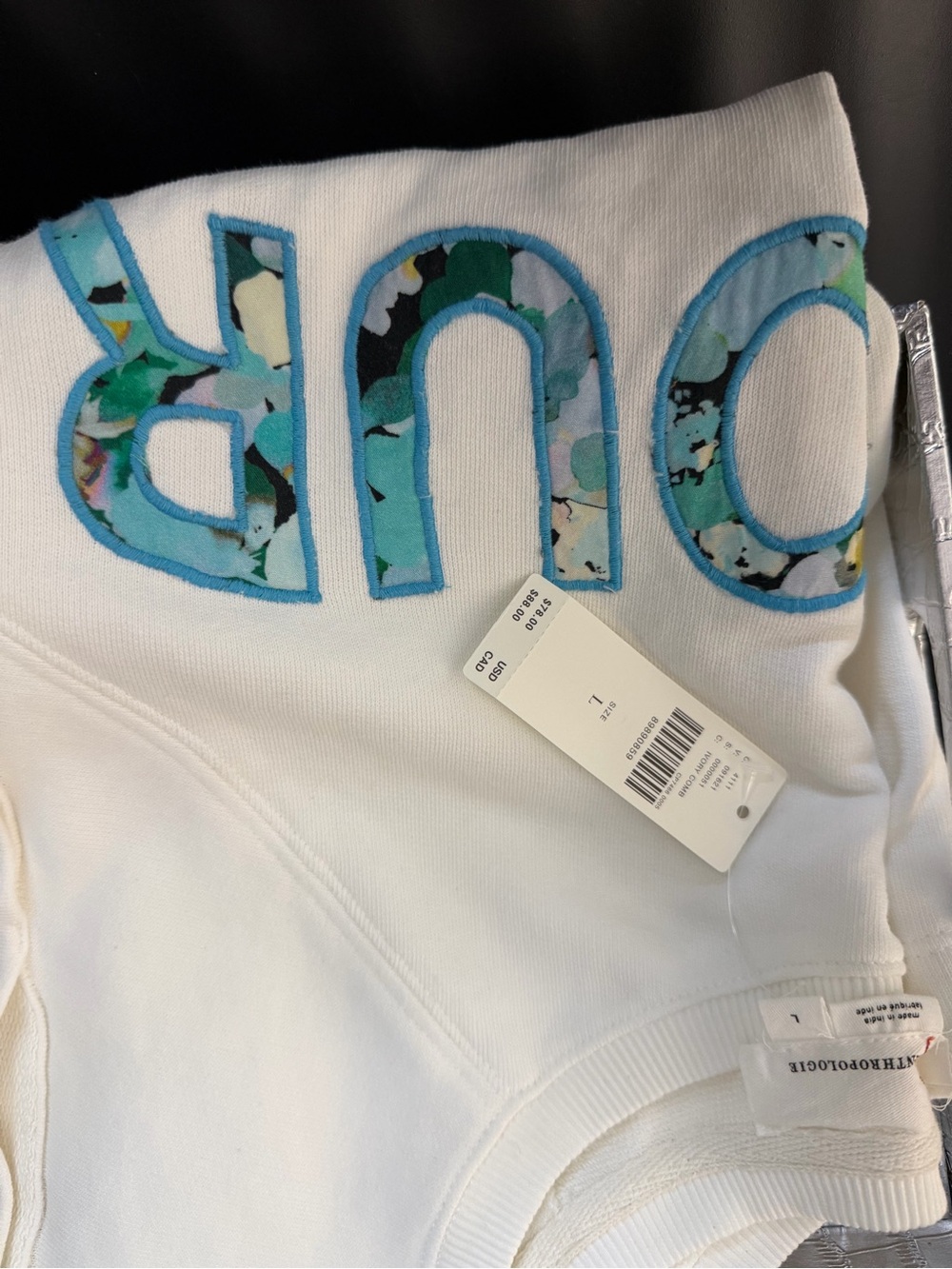 Anthropologie White Sweatshirt with Aqua Floral Logo Appliqué